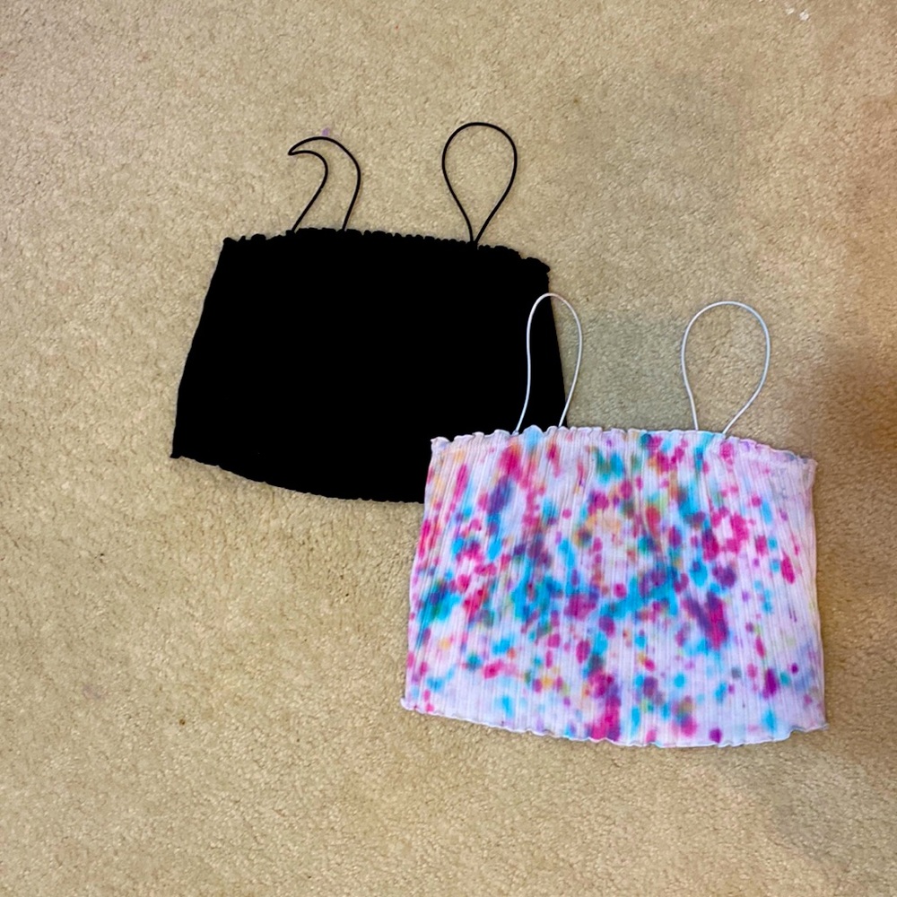 Two crop tops, one tie dye, one black one